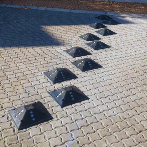 rubber-speed-bumps-with-cat-eyes-installation-for-school-zones-muncipal-road-and-estates.